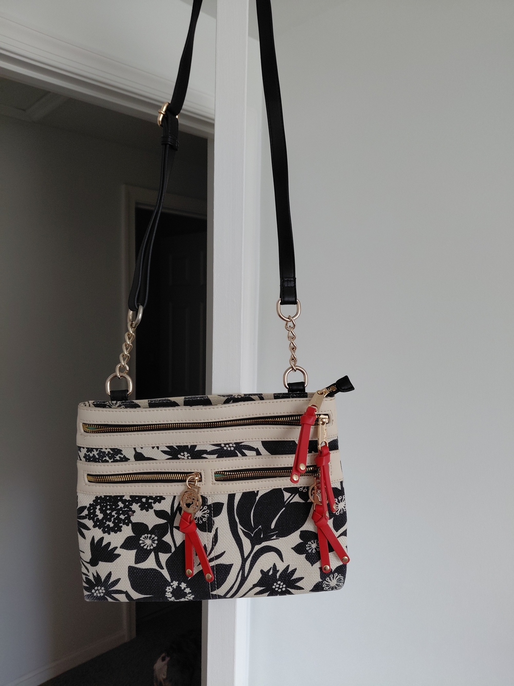 Spartina 449 Black-and-Cream Floral Crossbody with Red Tassel Accents